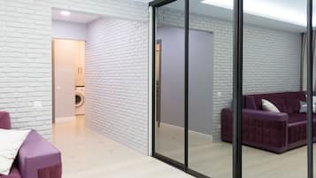 Design Apartment | Living room | 40-inch flat-screen TV with cable channels, TV