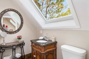 Bathtub, hair dryer, towels