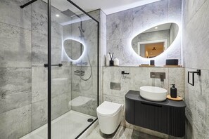 Bathtub, hair dryer, towels, soap