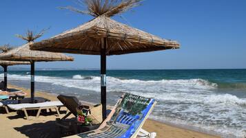 Private beach nearby, white sand, sun loungers, beach umbrellas