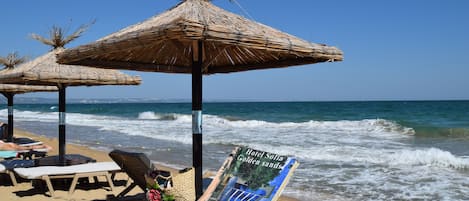 Private beach nearby, white sand, sun loungers, beach umbrellas