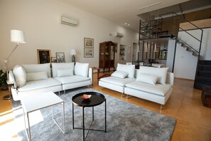 Luksushuoneisto | Oleskelualue | Taulutelevisio