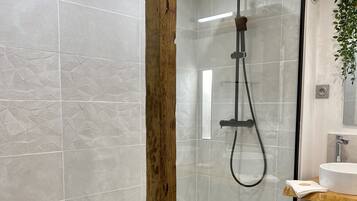 Shower, hair dryer, towels, soap