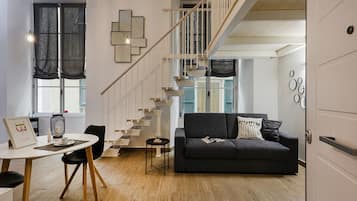 Apartamento família | Área de estar