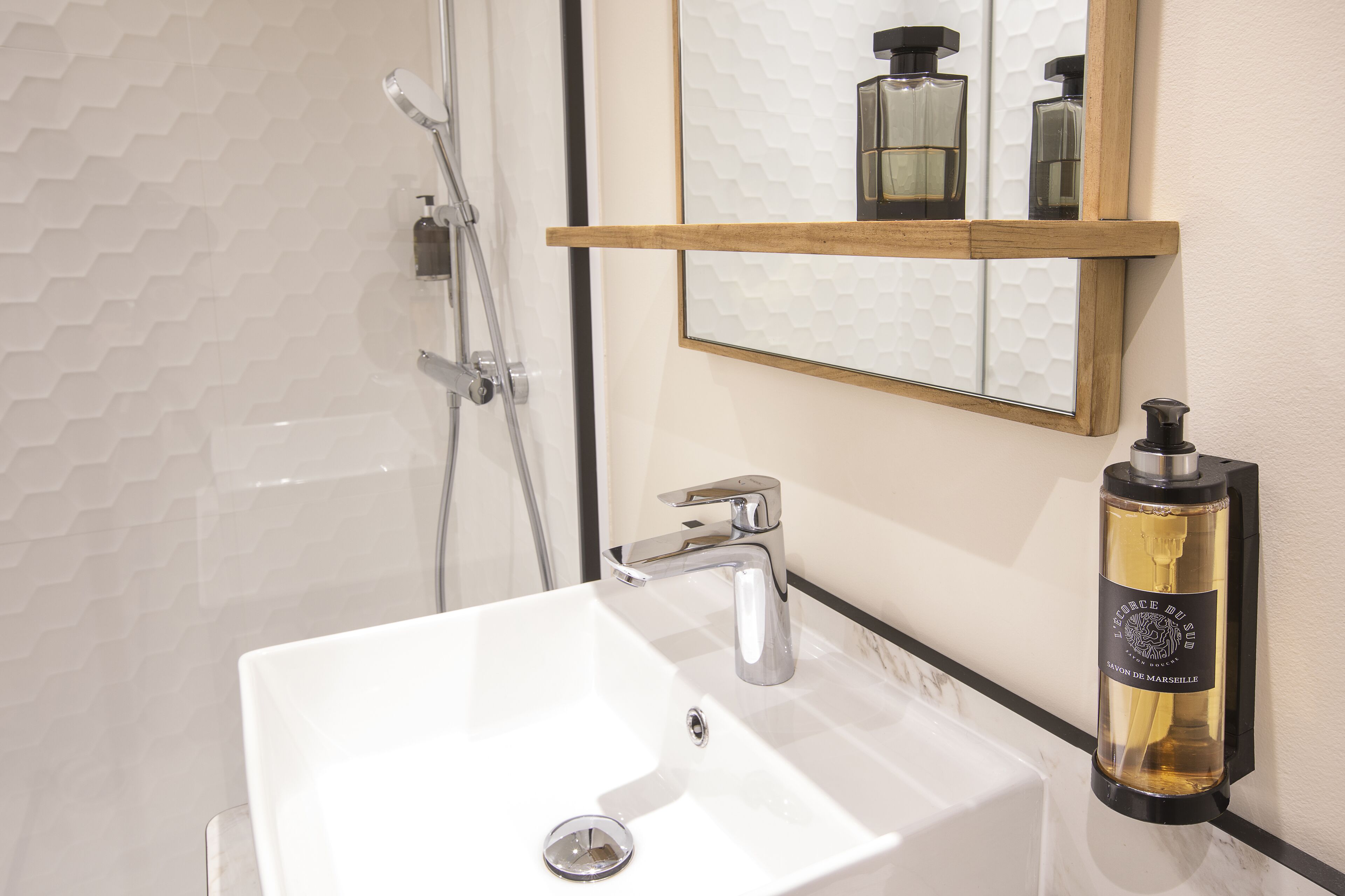 shower, rainfall showerhead, eco-friendly toiletries, towels