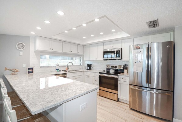 Fridge, microwave, oven, stovetop - Anastasia Condos 107- Three bedroom, direct oceanfront condo steps away from the ocean (St Augustine)