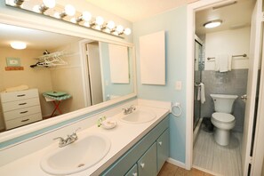 Bathtub, hair dryer, towels