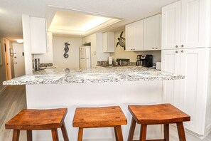 Fridge, microwave, oven, stovetop - Anastasia Condos 412- Newly remodeled, premier fourth floor condo near ocean (St Augustine)