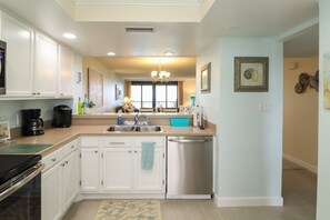 Fridge, microwave, oven, stovetop - Barefoot Trace 410-Luxury, Direct Oceanfront Two Bedroom Condo (St. Augustine)