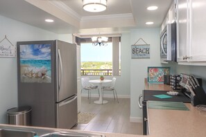 Fridge, microwave, oven, stovetop - Barefoot Trace 410-Luxury, Direct Oceanfront Two Bedroom Condo (St. Augustine)