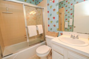 Bathtub, hair dryer, towels