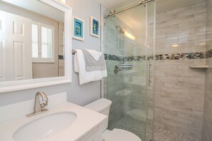 Bathtub, hair dryer, towels