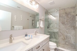 Bathtub, hair dryer, towels - Island South 35 Ocean Views Updated 2 Bed/2 Bath (St. Augustine)