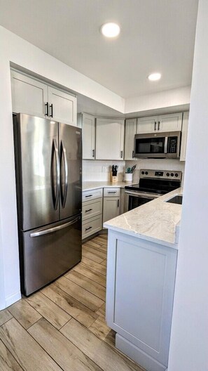 Fridge, microwave, oven, dishwasher