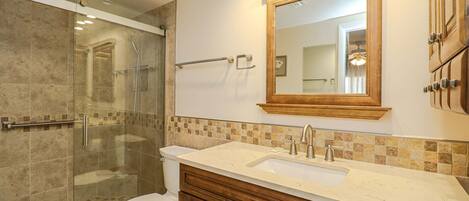 Bathtub, hair dryer, towels, soap