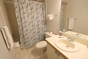 Bathtub, hair dryer, towels