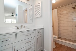 Bathtub, hair dryer, towels