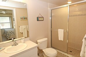 Bathtub, hair dryer, towels, soap