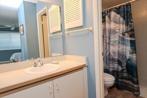 Bathtub, hair dryer, towels, soap
