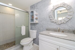 Bathtub, hair dryer, towels, soap