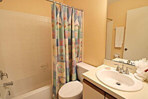 Bathtub, hair dryer, towels