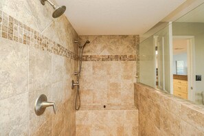 Bathtub, hair dryer, towels