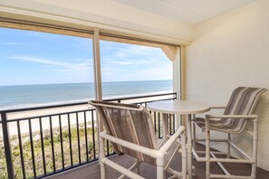 Outdoor dining - Windjammer 404 - Updated, 4th Floor Oceanfront Condo with Elevator Access (St. Augustine)