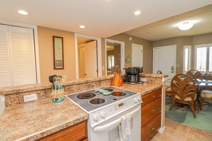Fridge, microwave, oven, stovetop - Windjammer 415 -Two Bedroom Direct Oceanfront, Gorgeous Water Views (St. Augustine)