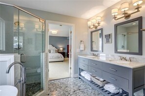 Combined shower/tub, hair dryer, towels, soap