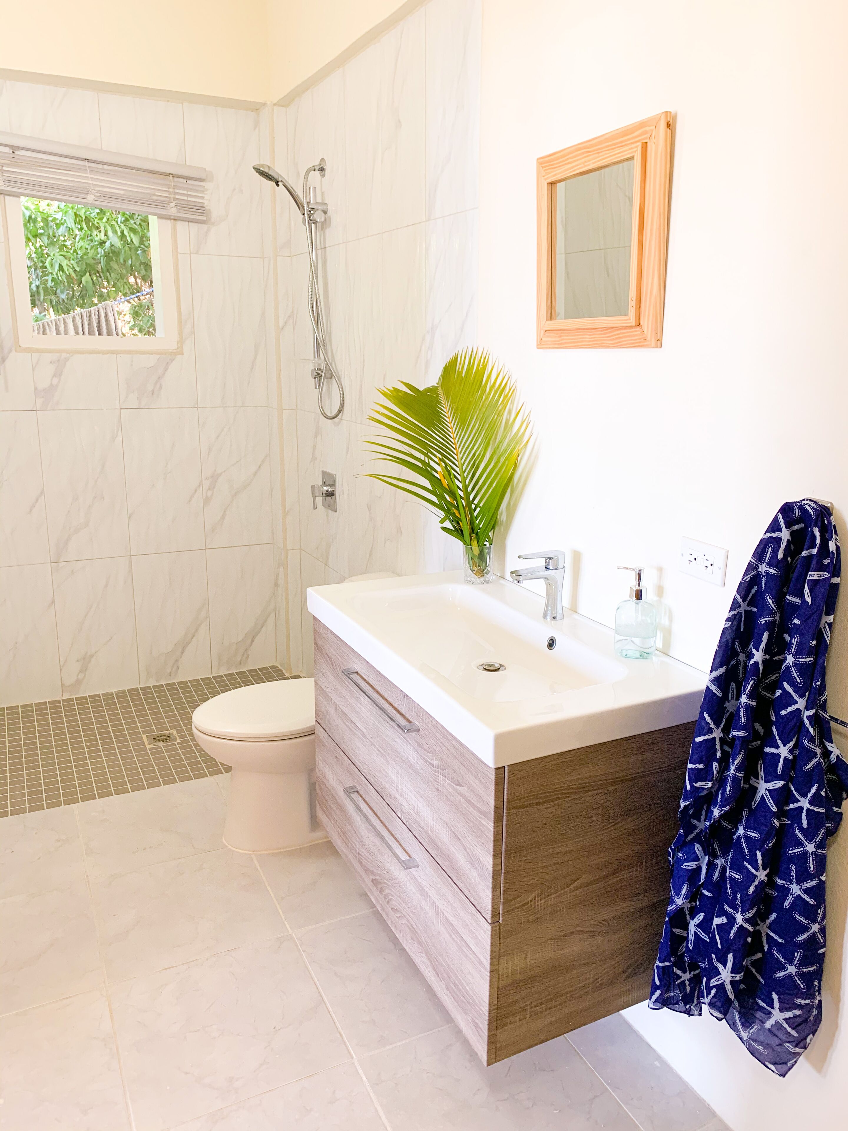 Bathtub, hair dryer, towels, soap