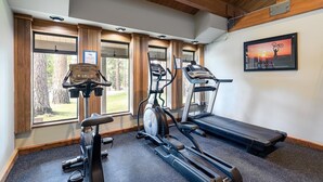 A gym with cardio equipment, a treadmill, and a stationary bike. - Vidor Village (Kings Beach)
