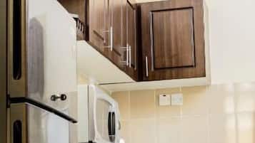 Fridge, microwave, cookware/dishes/utensils