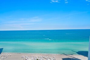 On the beach, sun-loungers, beach towels