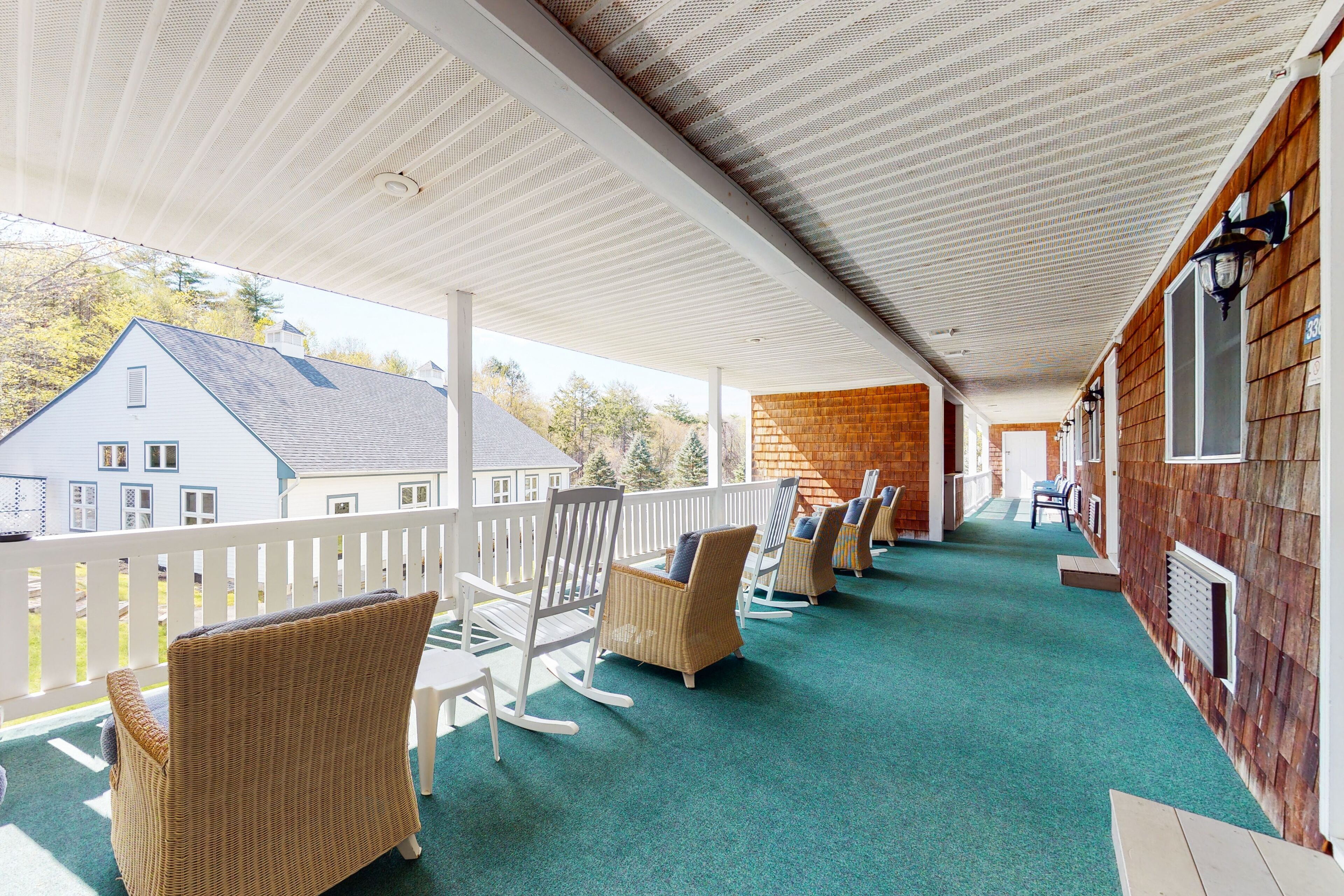 Cozy and convenient condo close to public beach with WiFi, pool, & patio