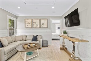 TV, fireplace - Dennis Dreams: 037-D  Heated Pool, Walk to Mayflower Beach, Sleeps 10 w/Guest House in Dennis (Dennis)