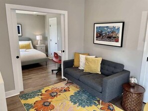 1 bedroom, desk, laptop workspace, iron/ironing board