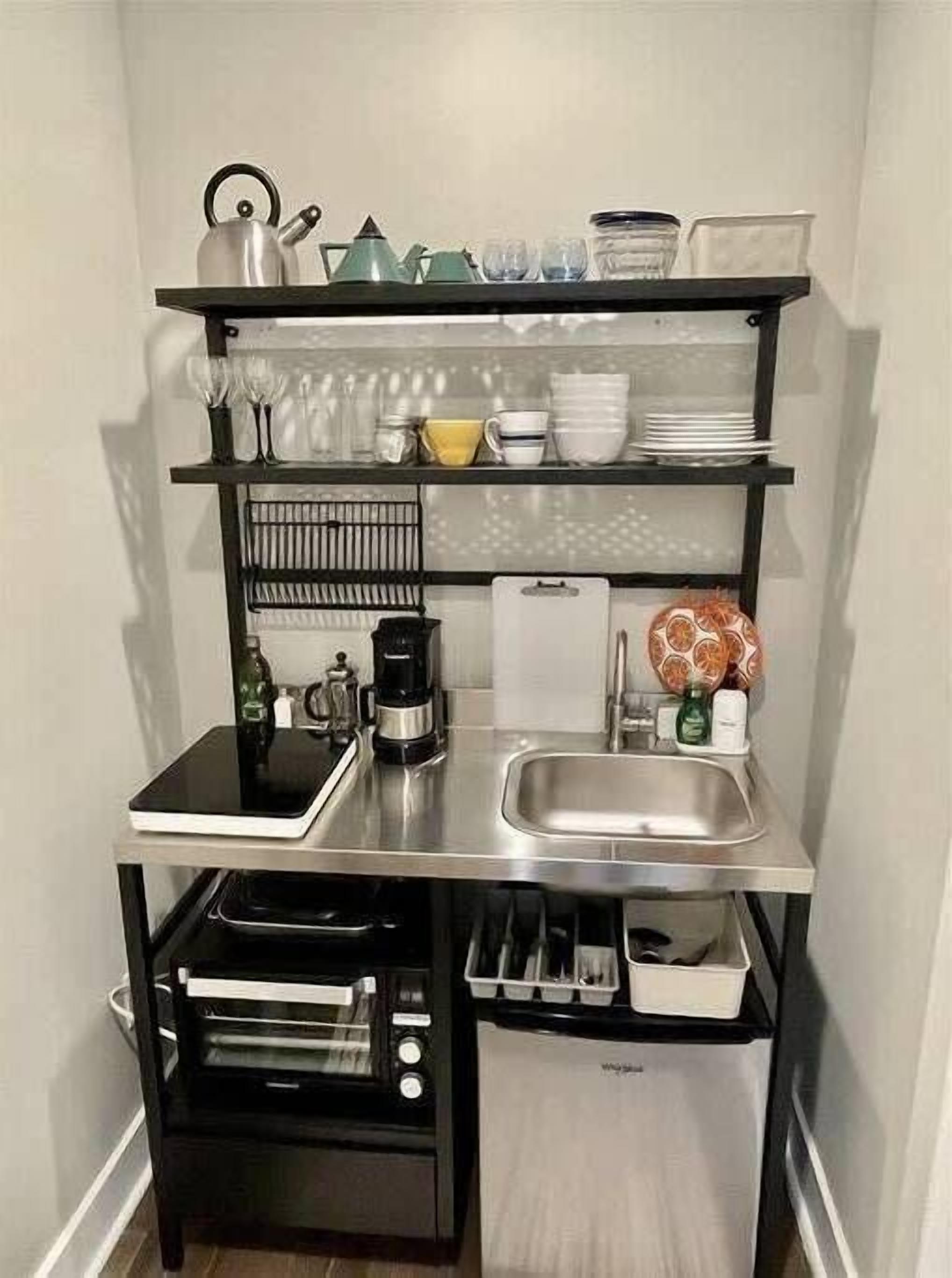 Coffee/tea maker, fridge, microwave, cookware/dishes/utensils