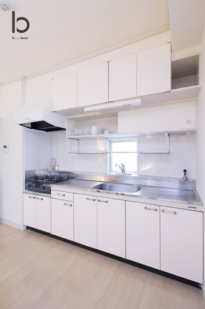 Apartment, 2 Bedrooms, Non Smoking (405) | Private kitchen | Fridge, microwave, cookware/dishes/utensils - Dai3Kuboi (Hiroshima)