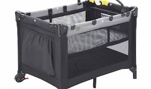 A portable crib with a mesh top and side panels, wheels, and a handle. - Marumasa 201 (Hiroshima)