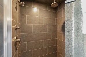 Combined shower/tub, hair dryer, towels, soap