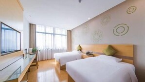 A hotel room with two beds, a desk, and a TV. - Greentree Inn Chuzhou Langya Mountain Scenic Area Xijian Road (Chuzhou)