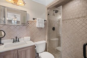 Shower, hair dryer, towels, shampoo