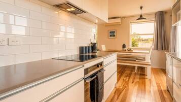 Coffee/tea maker, fridge, microwave, oven