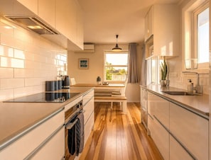 Coffee/tea maker, fridge, microwave, oven