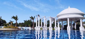 Outdoor pool, open 8:00 AM to 9:00 PM, sun loungers, lifeguards on site