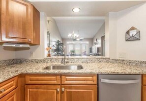 Fridge, microwave, oven, dishwasher - Seaside at Anastasia E302- Renovated Luxury Penthouse Condo: Walk to Ocean/Pool (St Augustine)