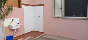 Shower, hair dryer, bidet, toilet paper