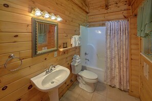 Shower, jetted bath, towels