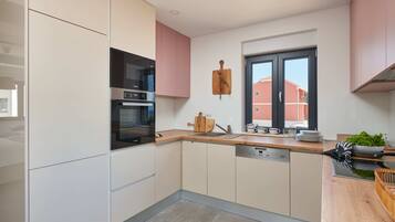 Apartment (Two Bedroom Apartment with Balcony) | Private kitchen | Fridge