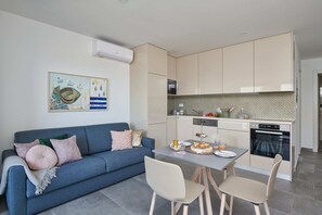 Apartment (One Bedroom Apartment with Balcony) | Living room | 25-inch TV with satellite channels - Irena Apartments (Konavle)